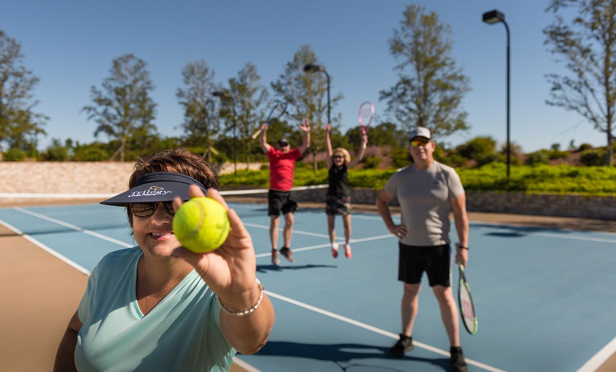 Members playing tennis at Ocala Preserve